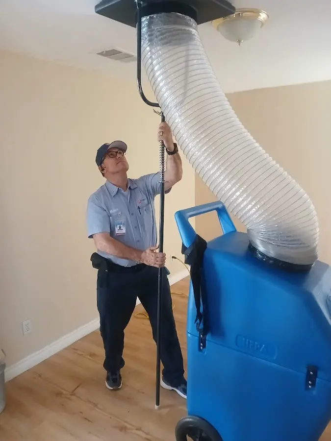 HVAC Installation technician using HEPA equipment in Iona